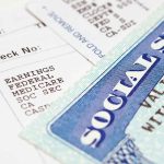 Auditors Flag Billions in Suspicious Food Stamp Activity Close-up of a pay stub and a social security card