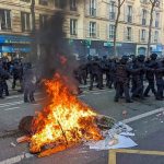 143-Year-Old Landmark TORCHED by French Rioters Fire burning on the street amid police presence.