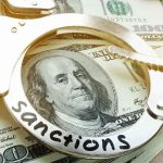 U.S. Hits Iran With NEW Sanctions Handcuffs on U.S. hundred-dollar bills