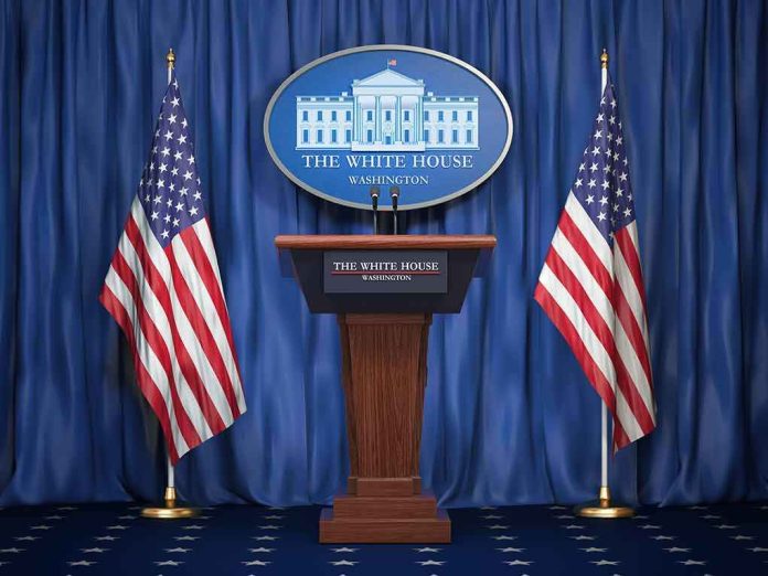 shutterstock_1159933525 White House press podium with microphones and two American flags
