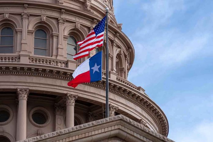 shutterstock_1216088524-1 Texas and U.S. flags in front of a capitol building dome