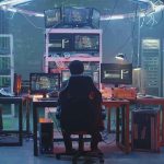 Foreign AI ‘PSYOP’ Aimed at Americans People working at computers in a dim server room