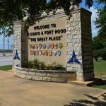 Fort Hood Shooter’s EXECUTION Date Is Set stone entrance sign with military unit emblems