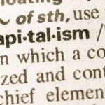 Close-up of dictionary entry highlighting the word capitalism